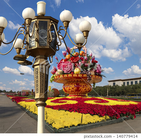 Street lamp and huge flower basket (against the background of a beautiful sky with clouds) in Tiananmen square, Beijing, China 140779414