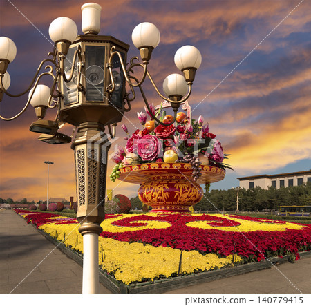 Street lamp and huge flower basket (against the sunset) in Tiananmen square, Beijing, China Street lamp and huge flower basket (against the sunset) in Tiananmen square, Beijing, China 140779415