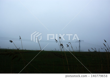 misty gloomy landscape cloudy sky field misty gloomy landscape cloudy sky field 140779658