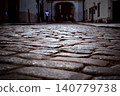 cobblestones in the old town in warsaw alley gate in the market square 140779738