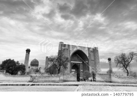 Cityscape with the Bibi-Khanym Mosque on a cloudy day, black and white photography Cityscape with the Bibi-Khanym Mosque on a cloudy day, black and white photography 140779795