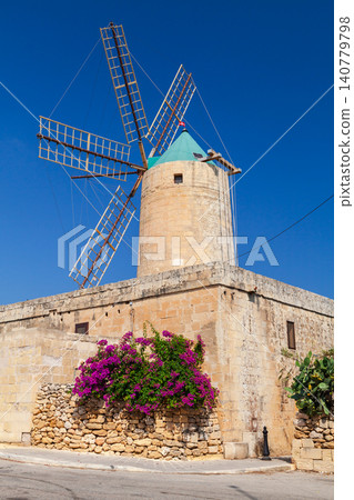 Rural scene of Malta with historic windmill on a sunny day Rural scene of Malta with historic windmill on a sunny day 140779798