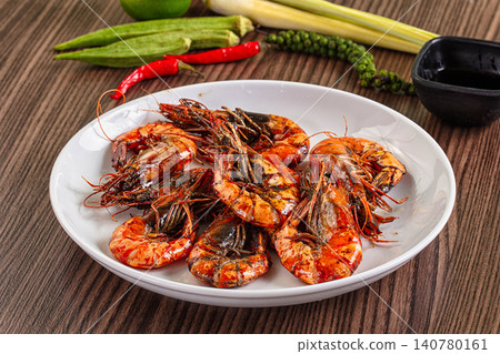 Grilled shrimp on white plate with fresh ingredients Grilled shrimp on white plate with fresh ingredients 140780161