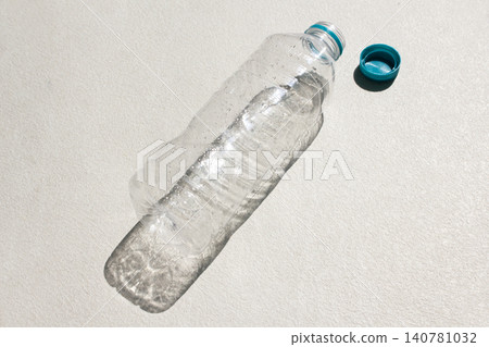 It is an empty plastic bottle. It is an empty plastic bottle. 140781032