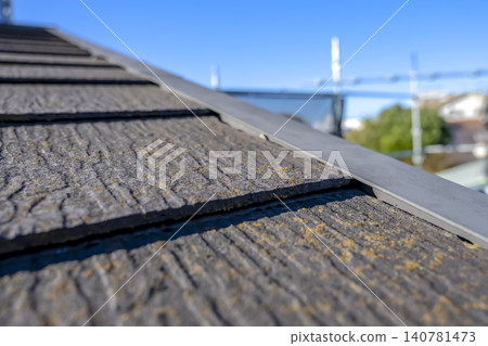Before roof covering work on a deteriorated roof of a detached house. Before roof covering work on a deteriorated roof of a detached house. 140781473