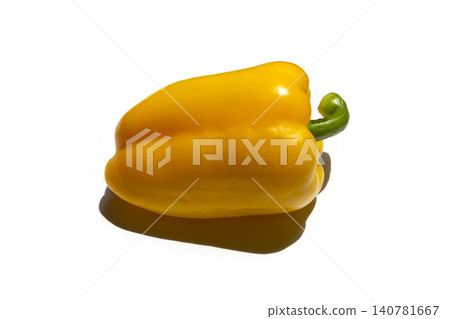 It is a bell pepper placed on a white background. It is a bell pepper placed on a white background. 140781667