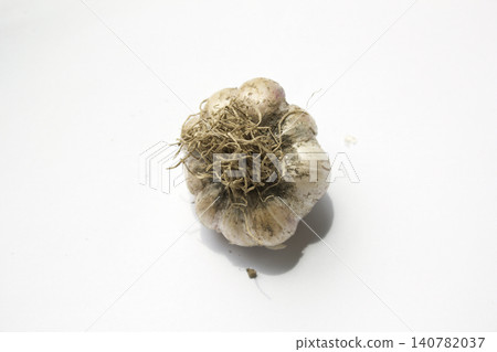 Garlic on a white background. 140782037