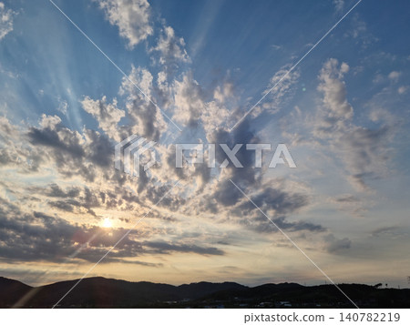 cloud and vanilla sky background with dark mountain silhouette cloud and vanilla sky background with dark mountain silhouette 140782219