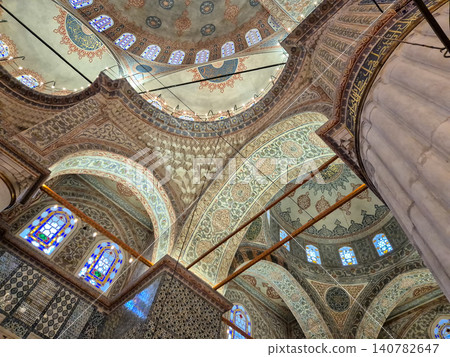Ornate mosque interior with decorative domed ceiling Ornate mosque interior with decorative domed ceiling 140782647