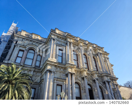 Historic ornate building facade with blue sky 140782660