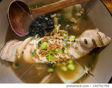 Bowl of chicken noodle soup with vegetables 140782766