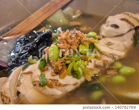 Close Up Bowl of Chicken Soup with Green Onions Close Up Bowl of Chicken Soup with Green Onions 140782769