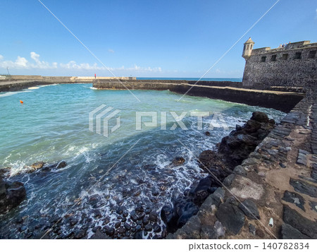 Historic seaside fort and ocean harbor view 140782834