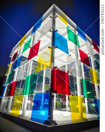 Colorful illuminated modern building facade at night Colorful illuminated modern building facade at night 140783221
