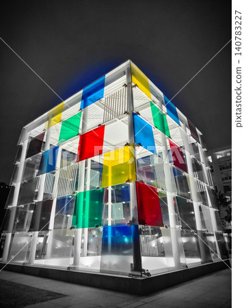 Illuminated modern glass pavilion with colorful panels 140783227
