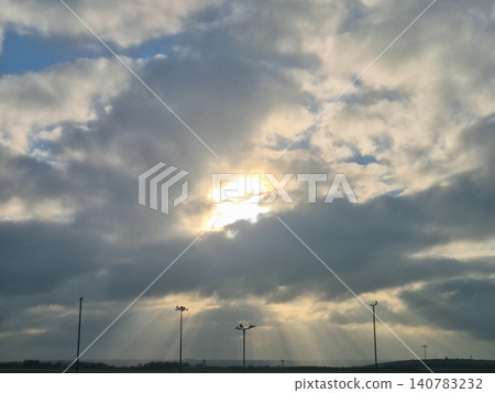 Sunbeams Breaking Through Dramatic Cloudy Sky 140783232