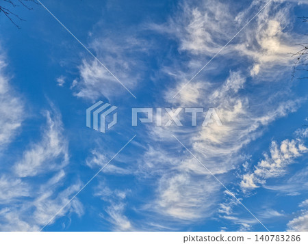 Blue sky with wispy cirrus clouds Blue sky with wispy cirrus clouds 140783286