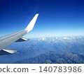 View from an airplane window during a trip to Europe 140783986