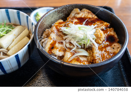 A delicious Hokkaido pork bowl and soba noodle set. A delicious Hokkaido pork bowl and soba noodle set. 140784038