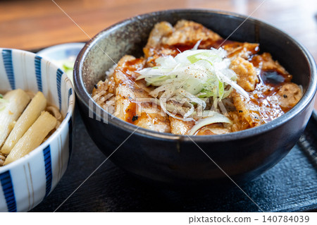 A delicious Hokkaido pork bowl and soba noodle set. A delicious Hokkaido pork bowl and soba noodle set. 140784039