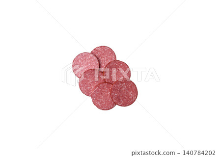 Slices of smoked salami or pepperoni for making sandwiches or pizza at home. Sausage slices 140784202
