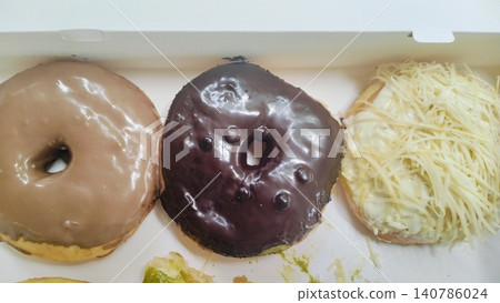Assorted Sweet Doughnuts with Various Toppings in Delivery Box Assorted Sweet Doughnuts with Various Toppings in Delivery Box 140786024