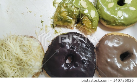 Assorted Sweet Doughnuts with Various Toppings in Delivery Box Assorted Sweet Doughnuts with Various Toppings in Delivery Box 140786026