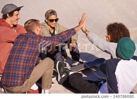 Skate park, high five and relax with friends, support and bonding together with happiness and conversation. Outdoor, hobby and hand gesture with recreation and team with success, smile or celebration Skate park, high five and relax with friends, support and bonding together with happiness and conversation. Outdoor, hobby and hand gesture with recreation and team with success, smile or celebration 140786080