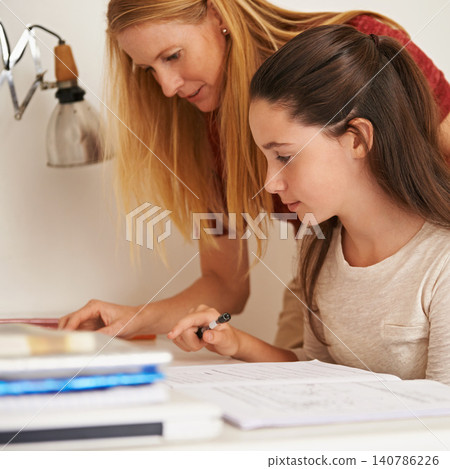 Teen, mom and help with schoolwork in home, student and support for assignment or project. Mother, girl and knowledge on weekend in bedroom, education and assistance or guidance for learning by desk Teen, mom and help with schoolwork in home, student and support for assignment or project. Mother, girl and knowledge on weekend in bedroom, education and assistance or guidance for learning by desk 140786226