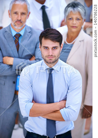 Portrait, leadership and business people with confident man, pride and solidarity in startup career. Community, professional men and women together in office for group, arms crossed and teamwork Portrait, leadership and business people with confident man, pride and solidarity in startup career. Community, professional men and women together in office for group, arms crossed and teamwork 140786228