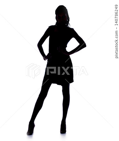 Silhouette, woman and confidence in studio in fashion dress, pride and heels for glamour by white background. Model, person and hands on hips in mock up for art deco, dark shadow and elegant figure Silhouette, woman and confidence in studio in fashion dress, pride and heels for glamour by white background. Model, person and hands on hips in mock up for art deco, dark shadow and elegant figure 140786249