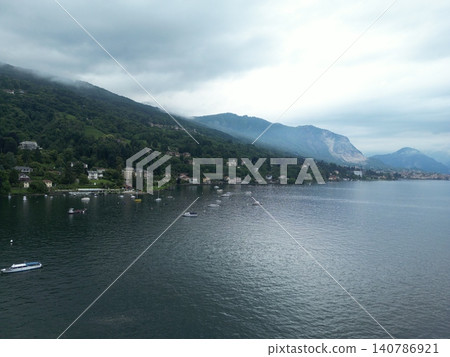 Cloudy skies loom over calm waters Cloudy skies loom over calm waters 140786921