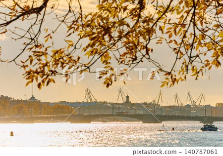 Russia, St.Petersburg, the drawbridge of the Palace at sunset, University embankment, cars traffic, the cabinet of curiosities museum, rostral columns, cranes of shipyard Russia, St.Petersburg, the drawbridge of the Palace at sunset, University embankment, cars traffic, the cabinet of curiosities museum, rostral columns, cranes of shipyard 140787061