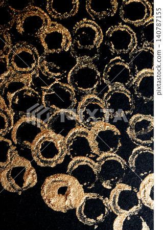 Gold metallic paint brush smear stroke golden bronze color stain shiny glittering textured background Gold metallic paint brush smear stroke golden bronze color stain shiny glittering textured background 140787155