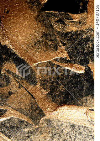 Gold metallic paint brush smear stroke golden bronze color stain shiny glittering textured background 140787158