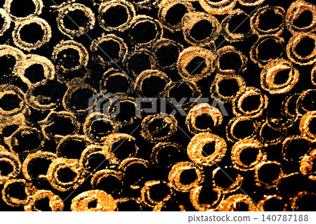 Gold metallic paint brush smear stroke golden bronze color stain shiny glittering textured background 140787188