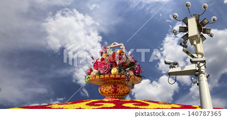 Street lamp and huge flower basket (against the background of a beautiful sky with clouds) in Tiananmen square, Beijing, China Street lamp and huge flower basket (against the background of a beautiful sky with clouds) in Tiananmen square, Beijing, China 140787365