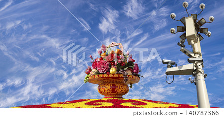 Street lamp and huge flower basket (against the background of a beautiful sky with clouds) in Tiananmen square, Beijing, China 140787366