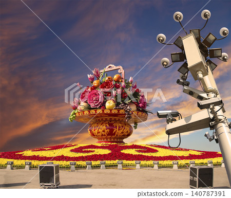 Street lamp and huge flower basket (against the sunset) in Tiananmen square, Beijing, China 140787391