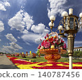 Street lamp and huge flower basket (against the background of a beautiful sky with clouds) in Tiananmen square, Beijing, China 140787456