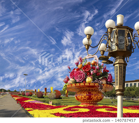 Street lamp and huge flower basket (against the background of a beautiful sky with clouds) in Tiananmen square, Beijing, China Street lamp and huge flower basket (against the background of a beautiful sky with clouds) in Tiananmen square, Beijing, China 140787457