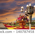 Street lamp and huge flower basket (against the sunset) in Tiananmen square, Beijing, China 140787458