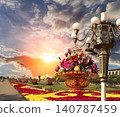 Street lamp and huge flower basket (against the sunset) in Tiananmen square, Beijing, China 140787459