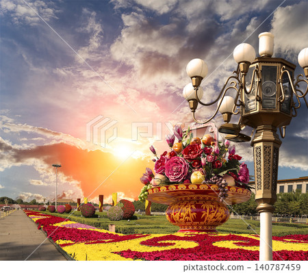 Street lamp and huge flower basket (against the sunset) in Tiananmen square, Beijing, China Street lamp and huge flower basket (against the sunset) in Tiananmen square, Beijing, China 140787459