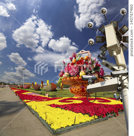 Street lamp and huge flower basket (against the background of a beautiful sky with clouds) in Tiananmen square, Beijing, China Street lamp and huge flower basket (against the background of a beautiful sky with clouds) in Tiananmen square, Beijing, China 140787460