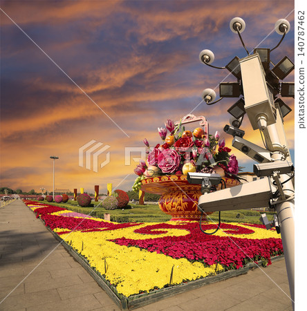 Street lamp and huge flower basket (against the sunset) in Tiananmen square, Beijing, China 140787462