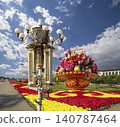 Street lamp and huge flower basket (against the background of a beautiful sky with clouds) in Tiananmen square, Beijing, China 140787464