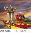 Street lamp and huge flower basket (against the sunset) in Tiananmen square, Beijing, China 140787466
