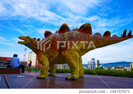 Stegosaurus mini dinosaur monument on the rooftop of the JR Fukui Station Tourist Exchange Center Stegosaurus mini dinosaur monument on the rooftop of the JR Fukui Station Tourist Exchange Center 140787671