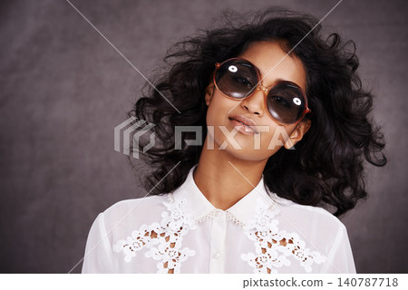 Studio, boho and fashion for portrait of woman with sunglasses and confidence for Indian girl. Dark background, adult and female person with unique style, relax and aesthetic for proud model Studio, boho and fashion for portrait of woman with sunglasses and confidence for Indian girl. Dark background, adult and female person with unique style, relax and aesthetic for proud model 140787718